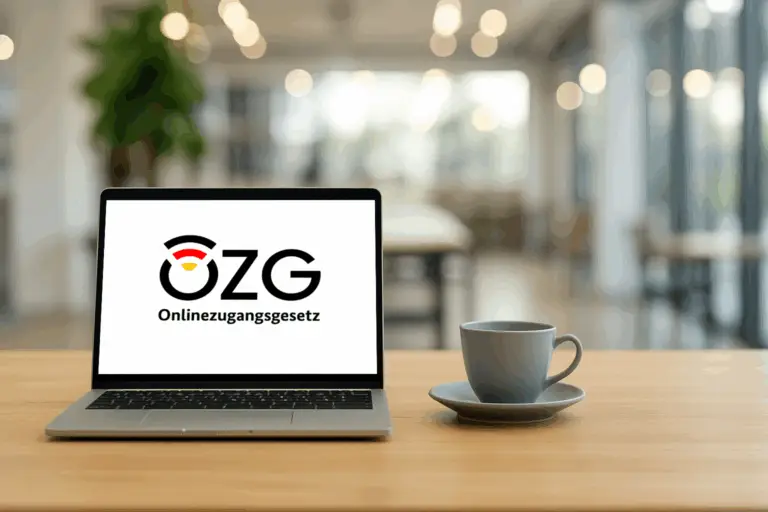 Laptop mit OZG-Logo auf dem Bildschirm – Symbolbild für die digitale Umsetzung des Onlinezugangsgesetzes im Handwerk.