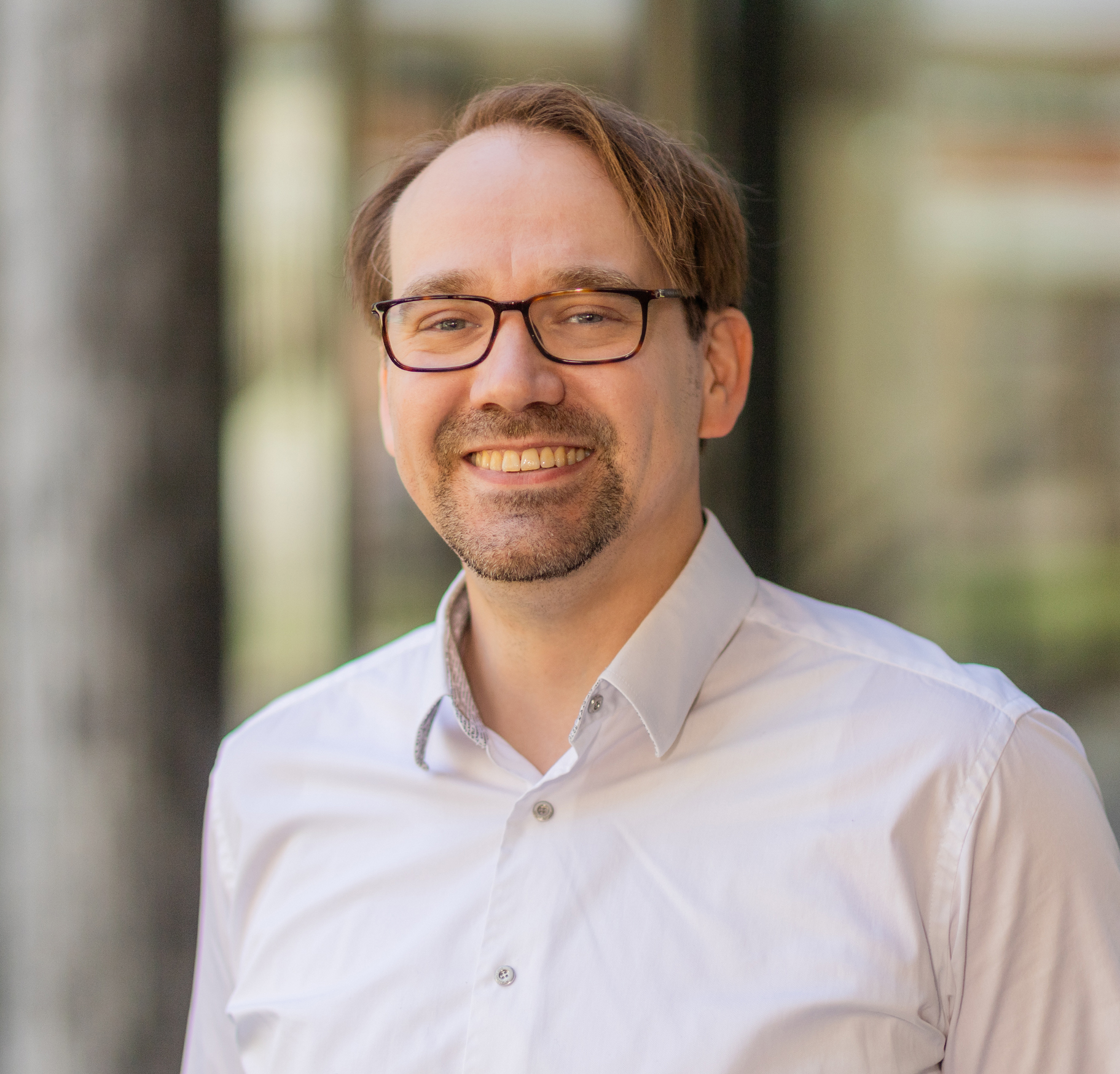 Portrait von Patrick Ostfeld, Geschäftsführer der UNIPLUS Software GmbH.